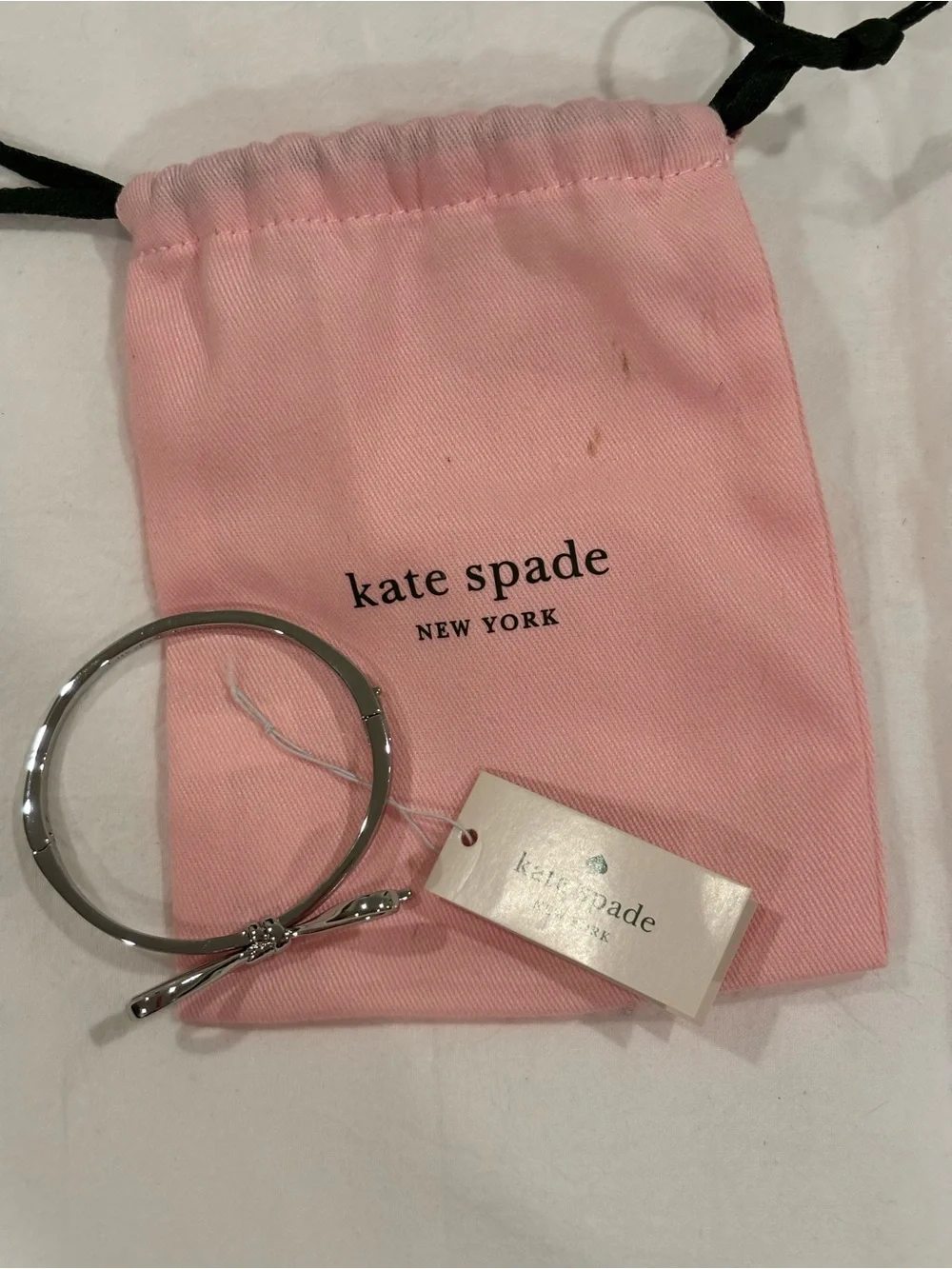 kate spade Silver Bow Hair Clip with Pink Logo Pouch